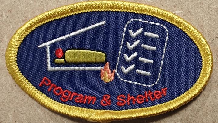 Shelter og Program mærke